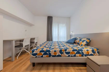 {area} de çift kişilik yataklı kiralık oda