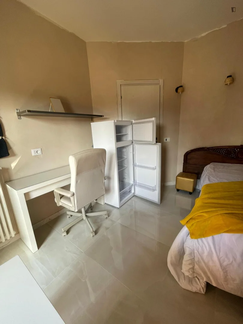 Student room in  with study area and shared facilities