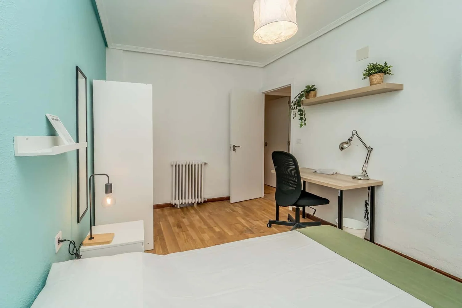 Student room in  with study area and shared facilities