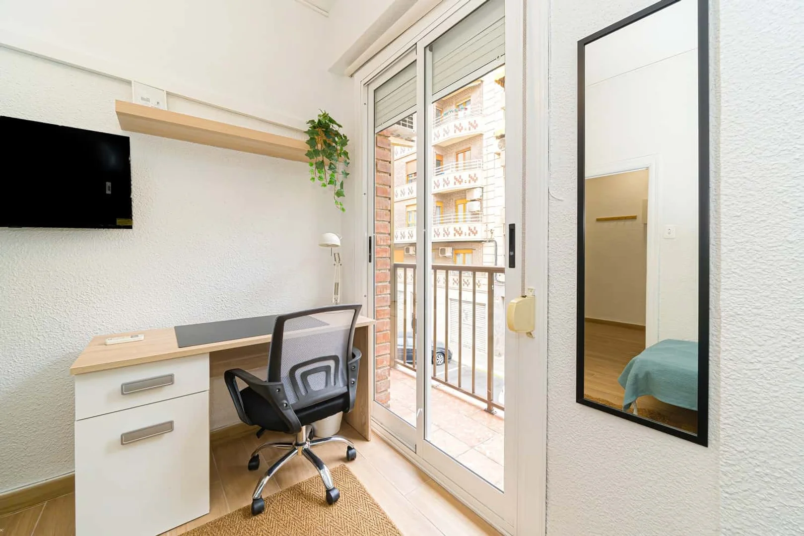 Student room in  with study area and shared facilities