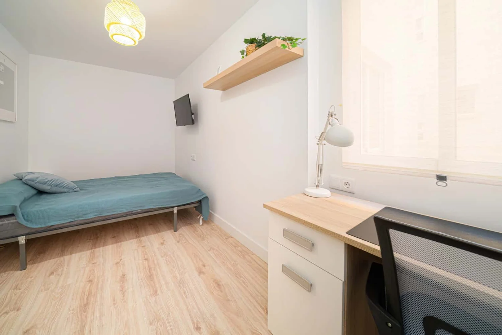 Student room in  with study area and shared facilities