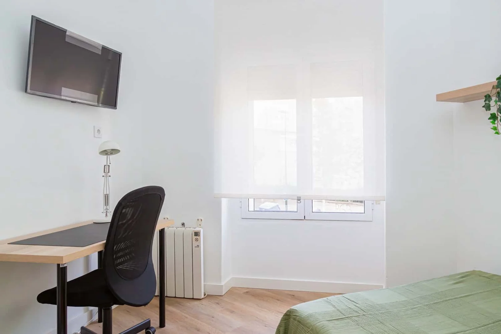 Student room in  with study area and shared facilities