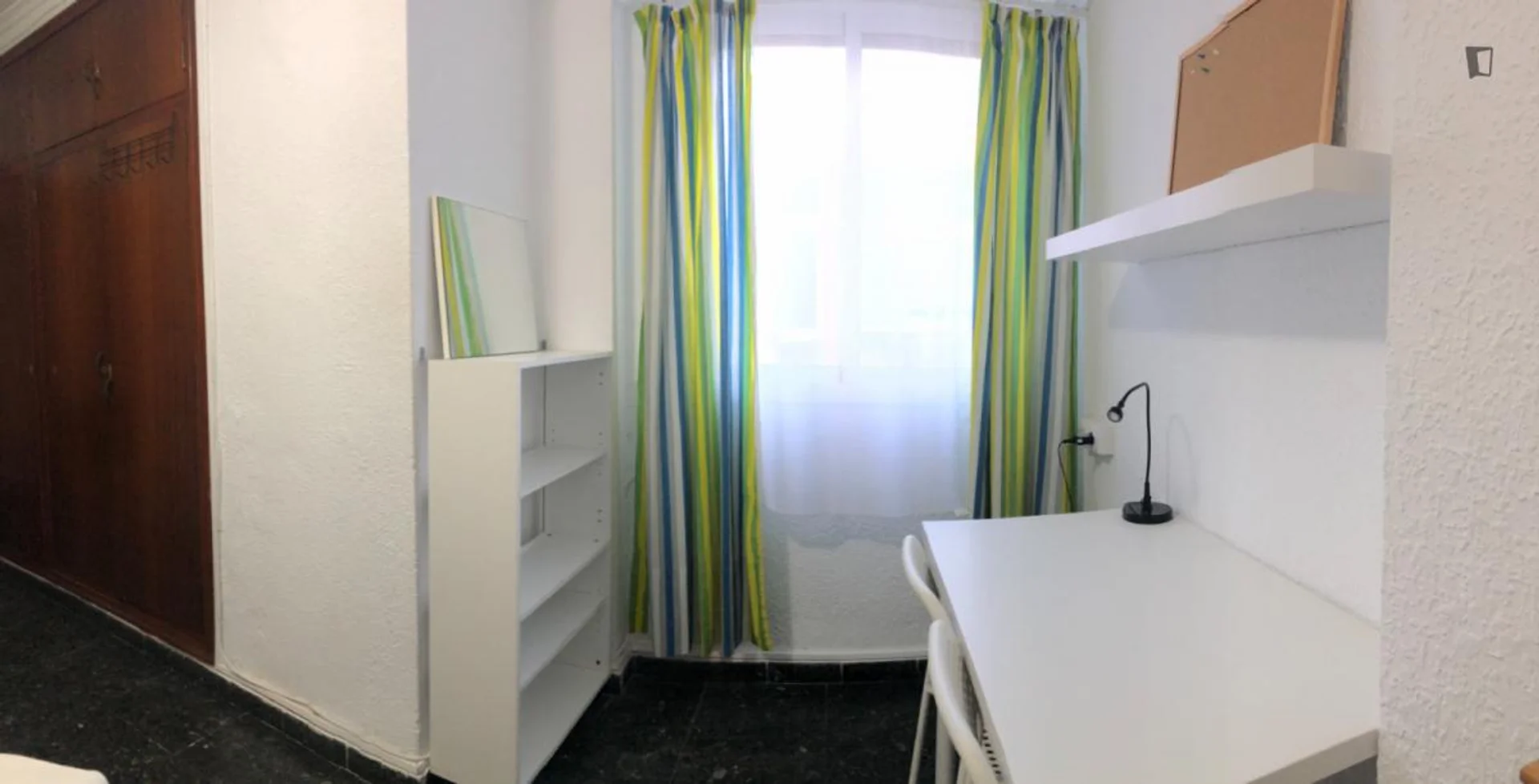 Affordable room for students with ample lighting in 