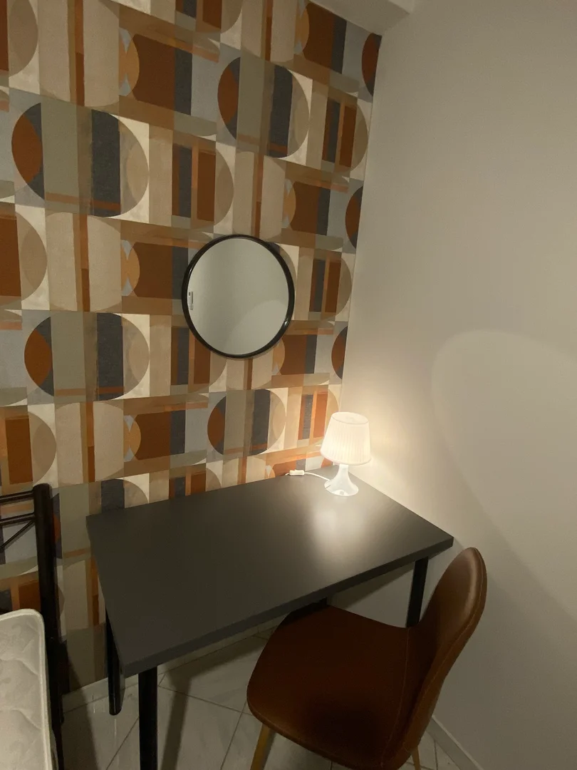 Student room in  with study area and shared facilities
