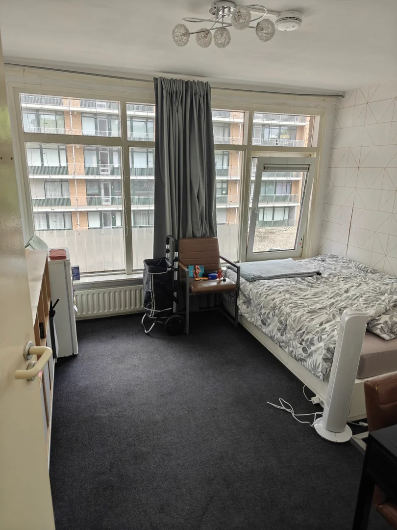 Student room in  with study area and shared facilities