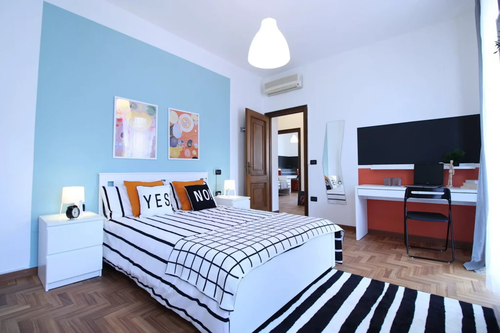 Student room in with study area and shared facilities