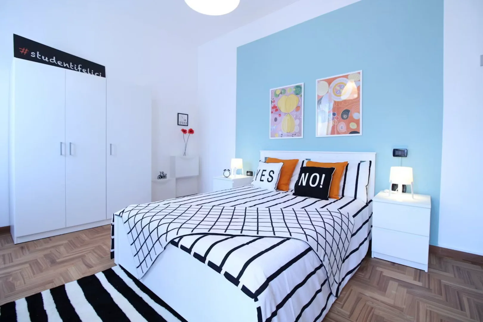 Student room in with study area and shared facilities