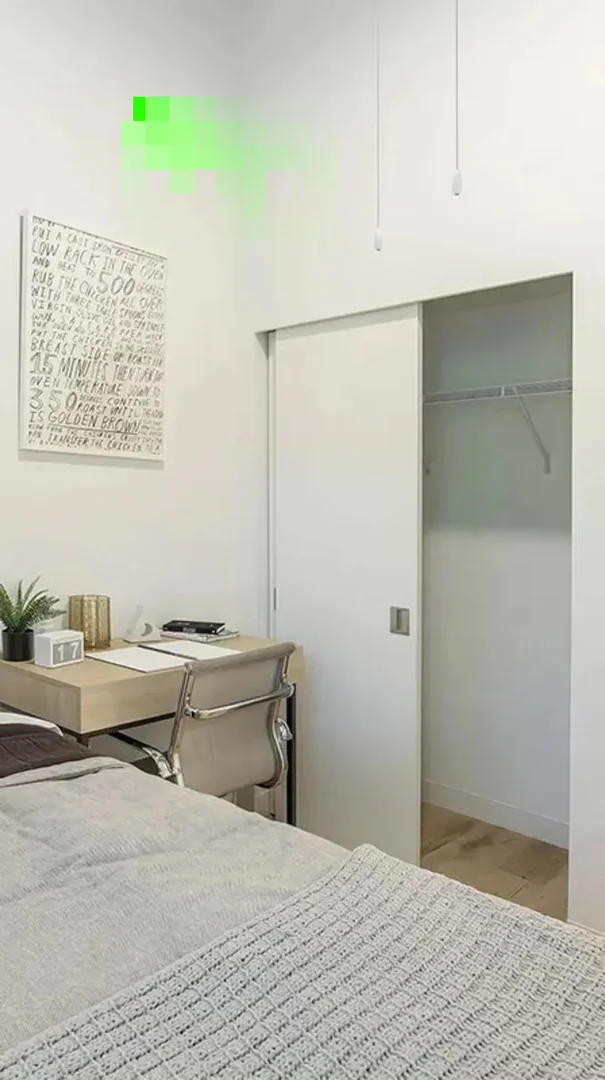 Student room in with study area and shared facilities