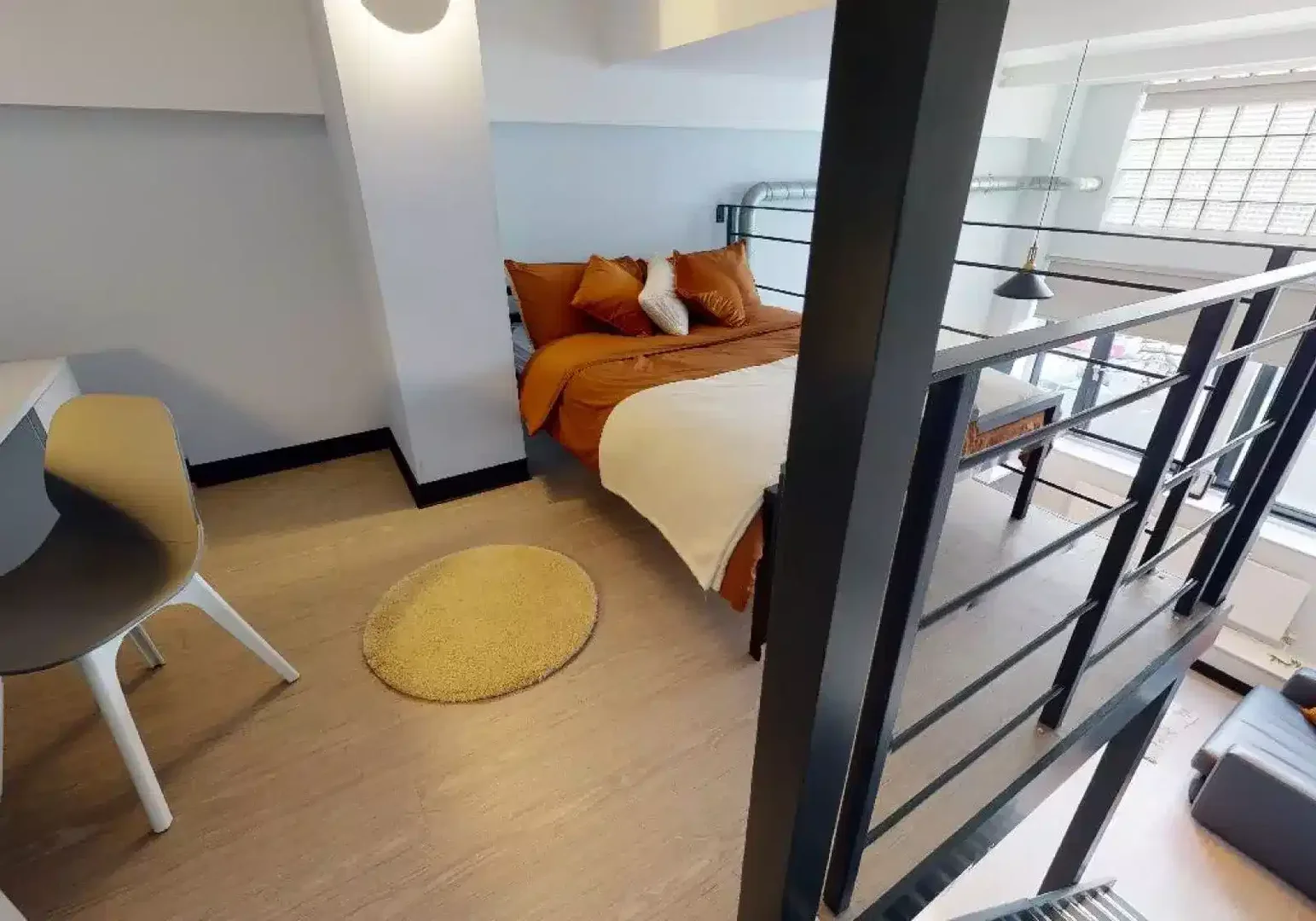 Student room in with study area and shared facilities