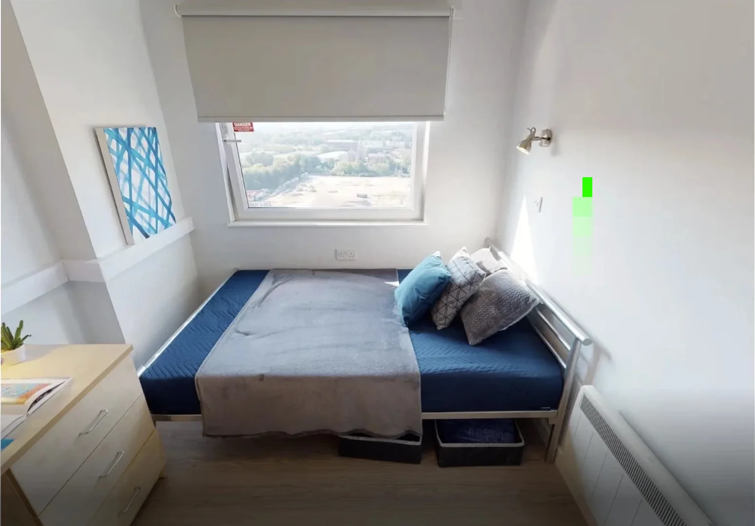 Affordable room for students with ample lighting in 