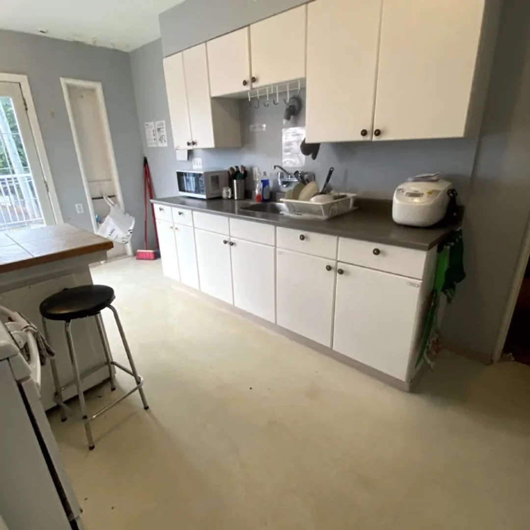 Student room in with study area and shared facilities