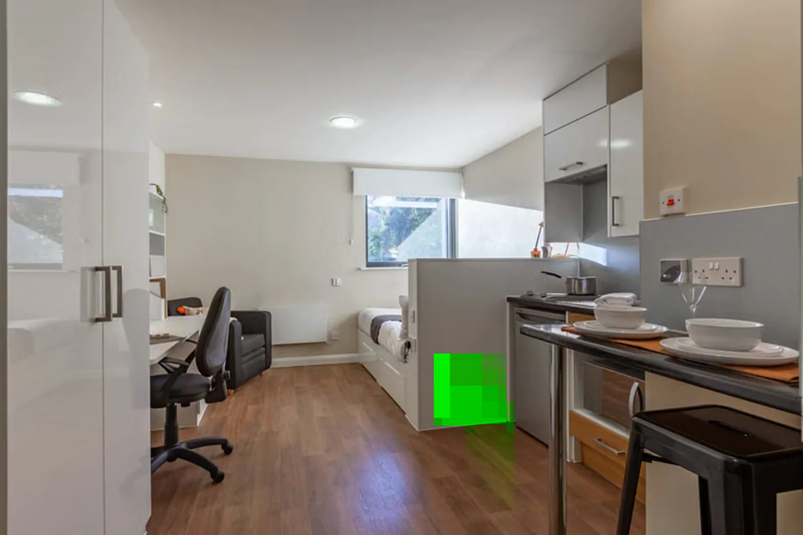 Monolocale minimalista per studenti in  con layout efficiente