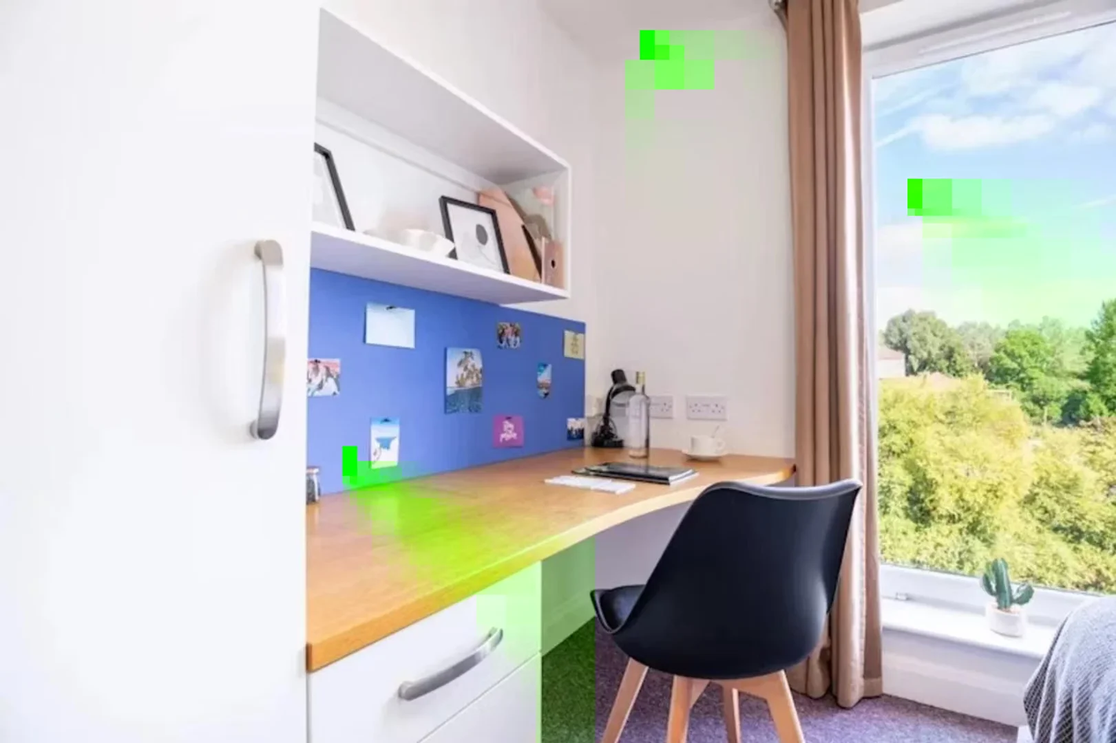 Student room in  with study area and shared facilities