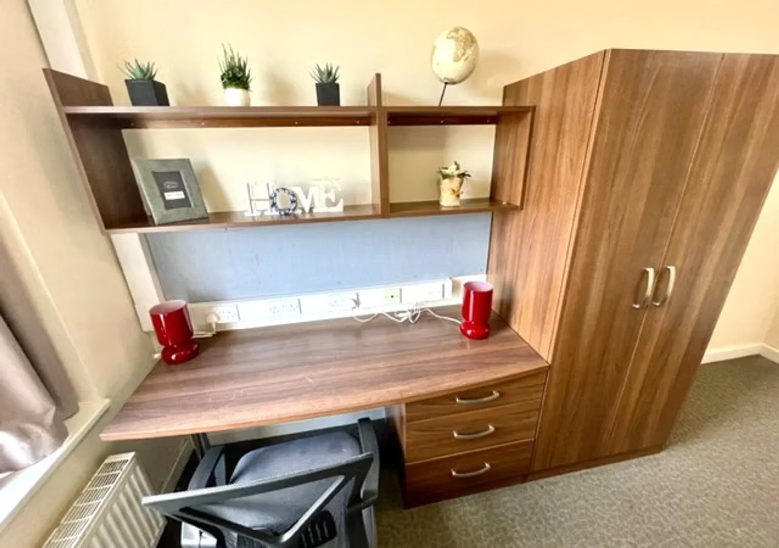 Student room in  with study area and shared facilities