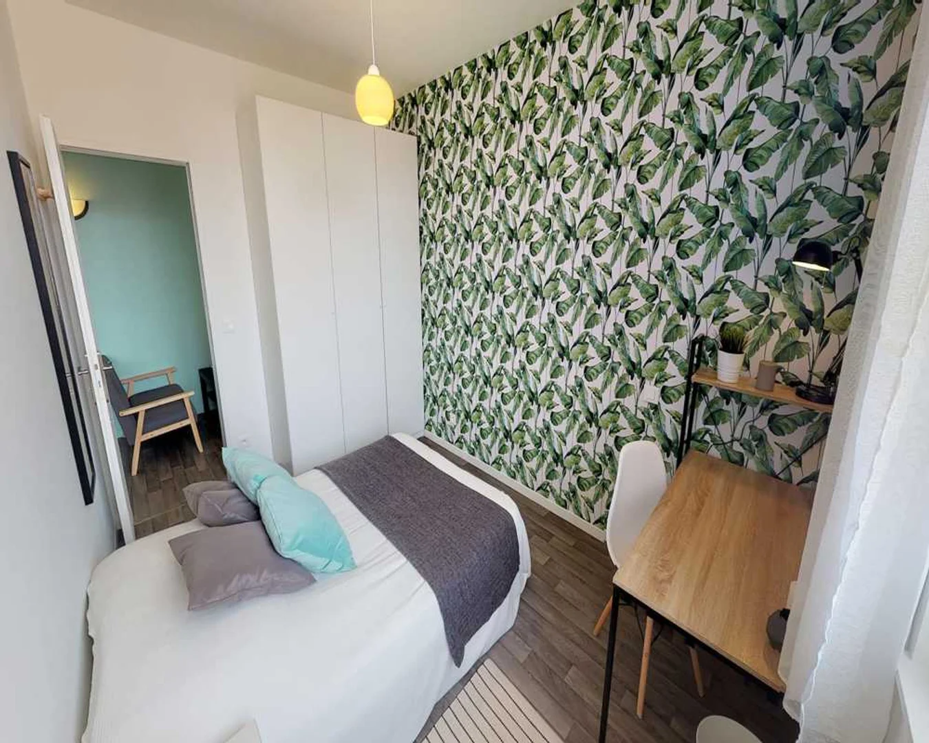 Student room in  with study area and shared facilities