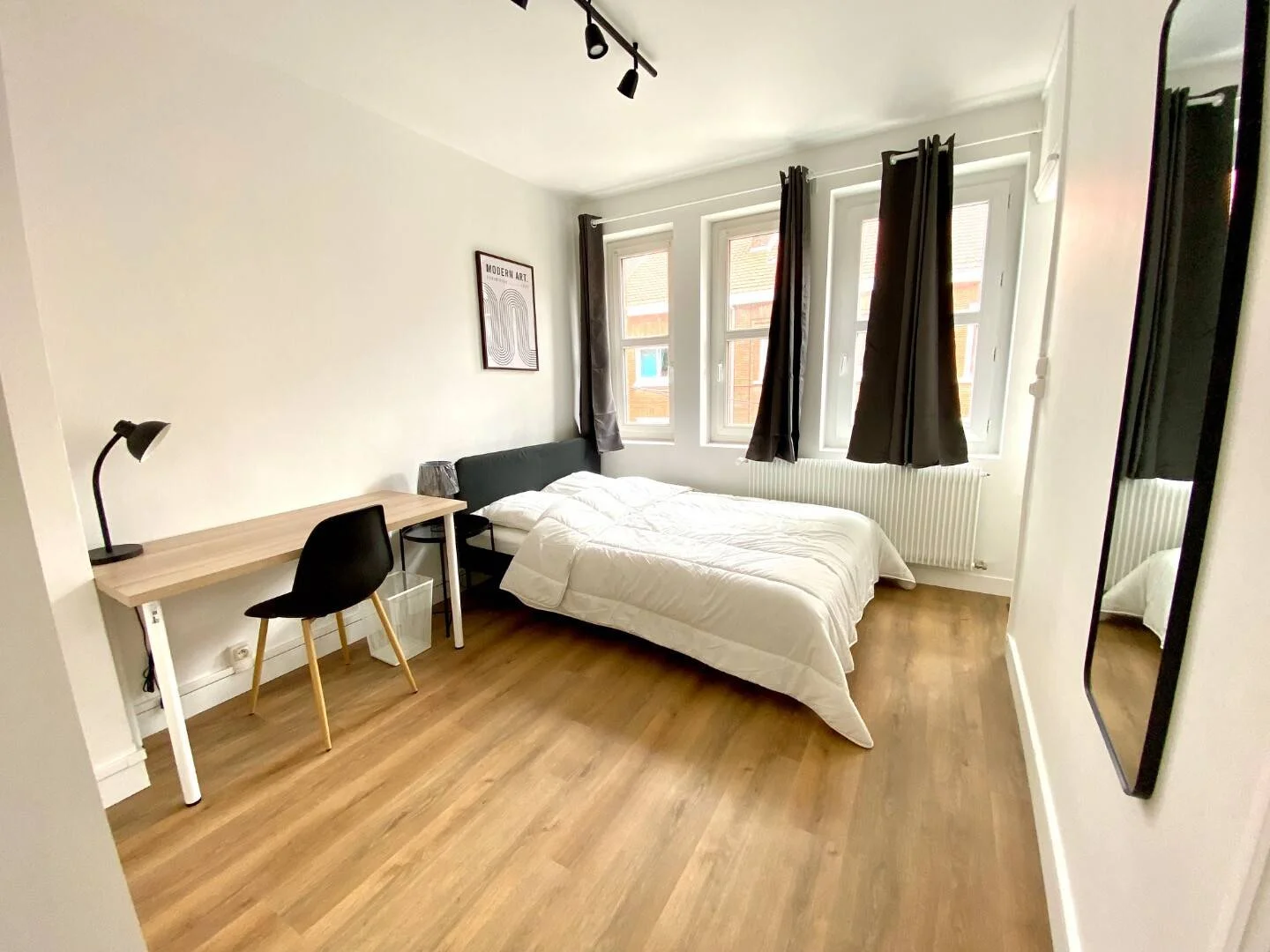 Student room in  with study area and shared facilities
