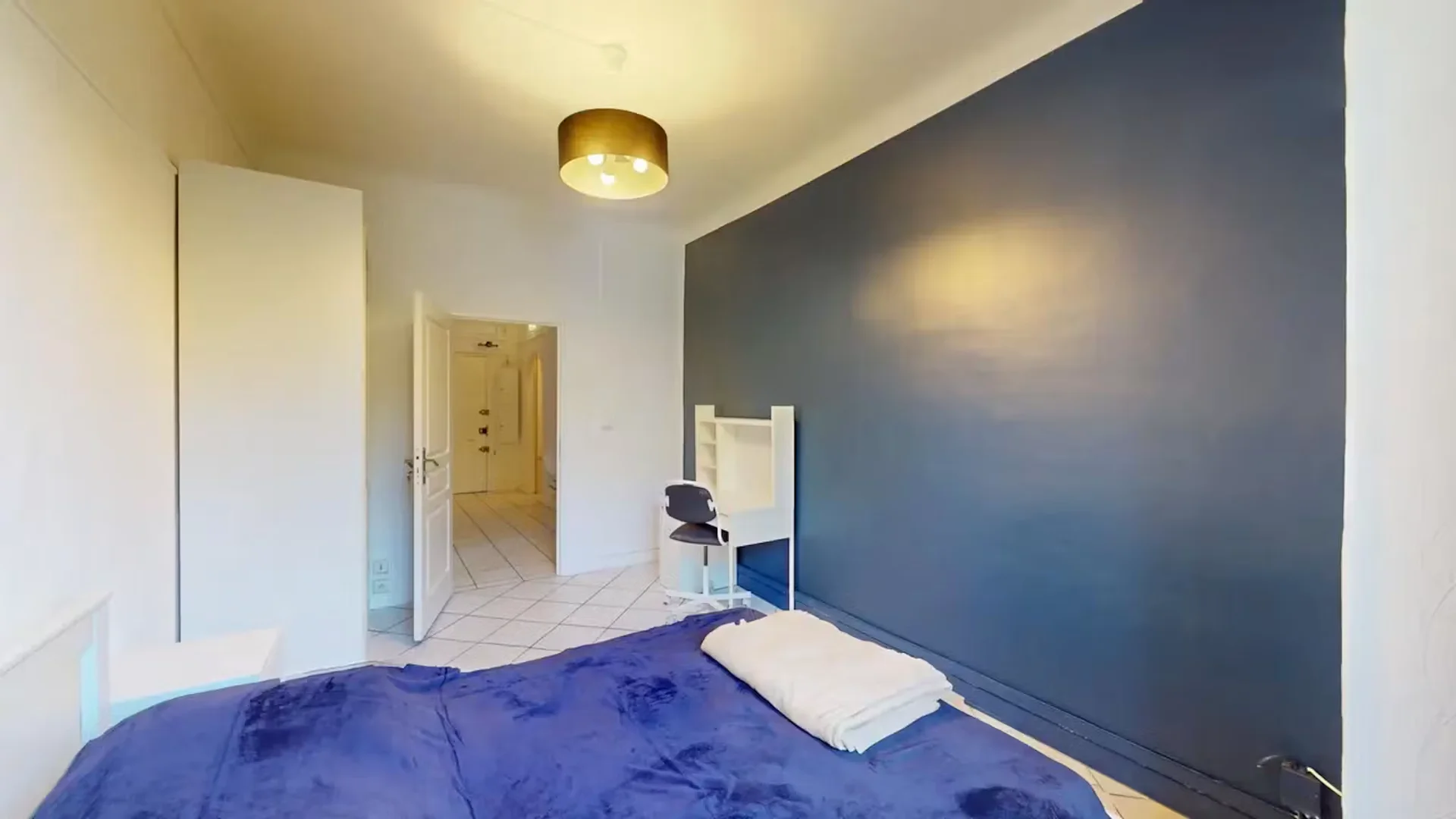 Student room in  with study area and shared facilities