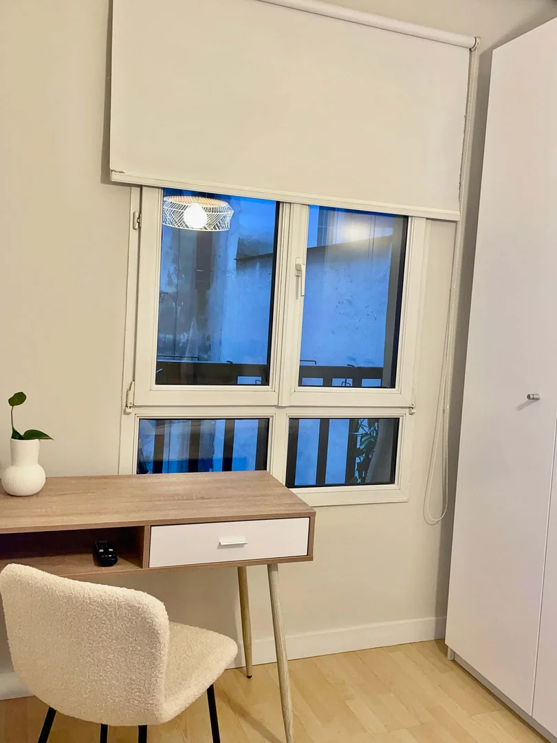 Student room in  with study area and shared facilities