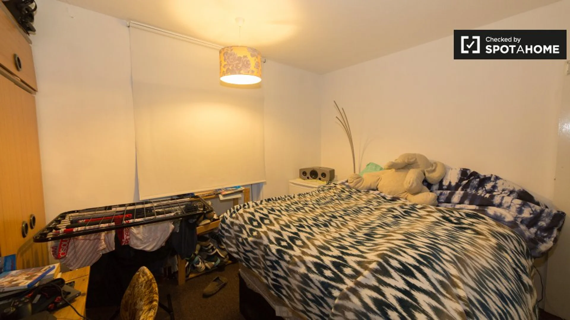Student room in with study area and shared facilities