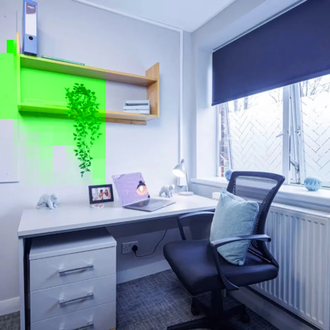Student room in  with study area and shared facilities