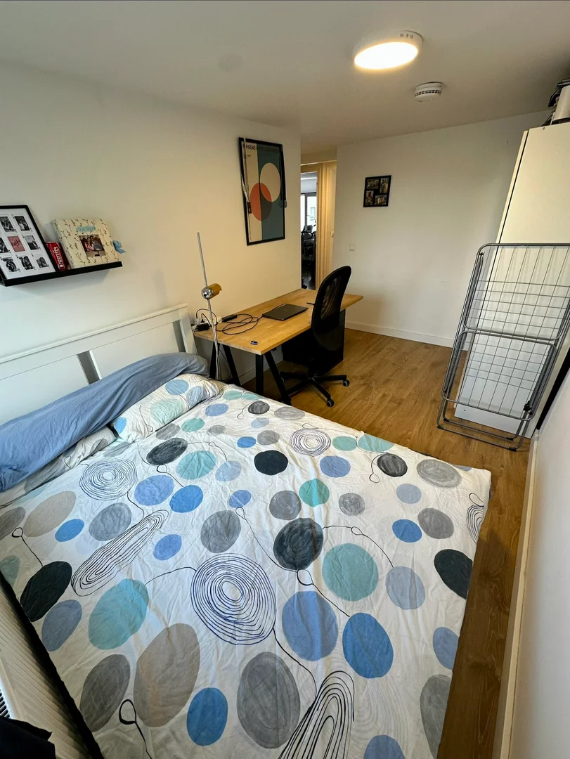 Student room in  with study area and shared facilities
