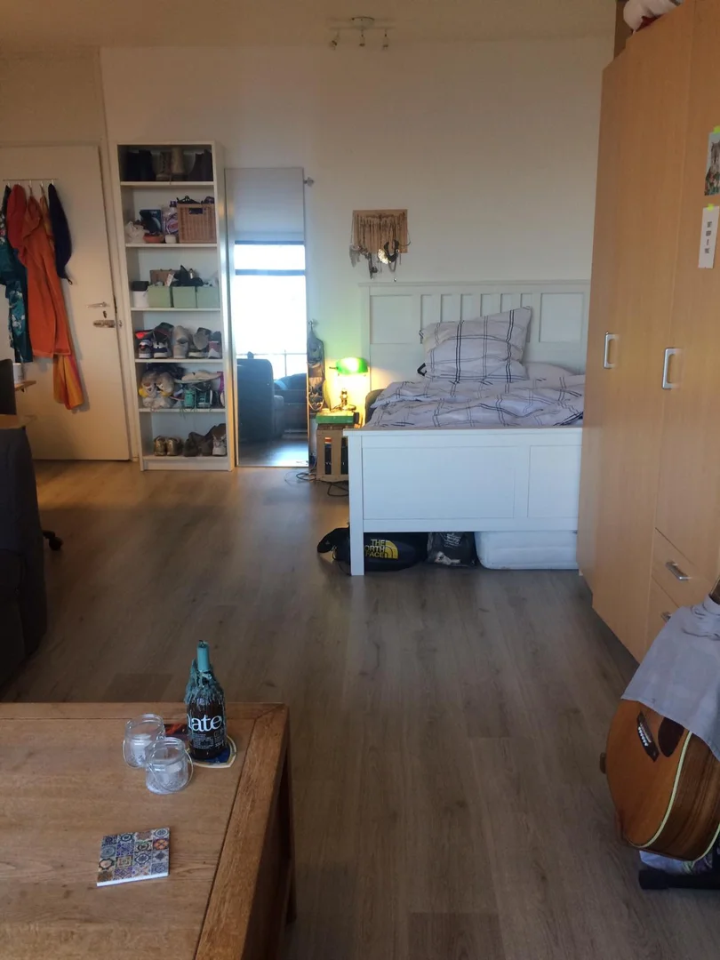 Student room in  with study area and shared facilities