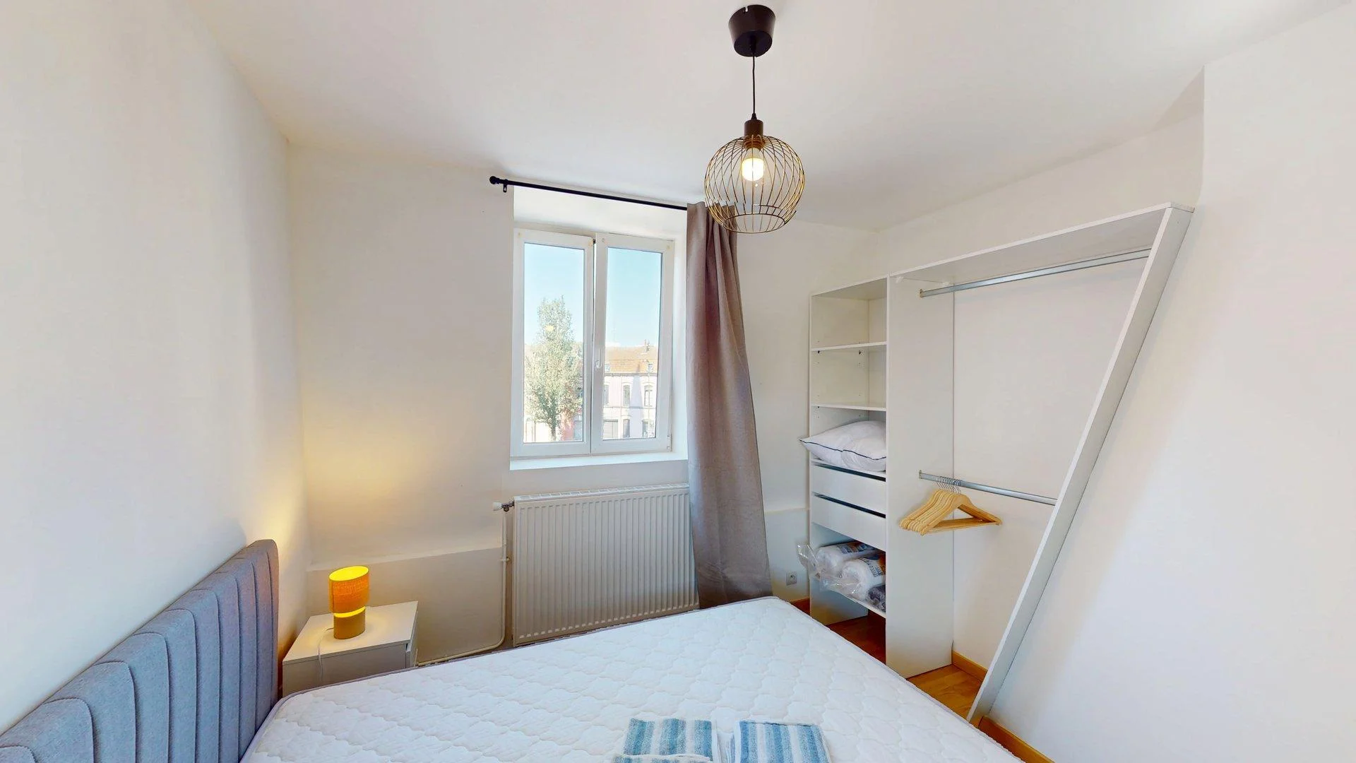 Student room in  with study area and shared facilities