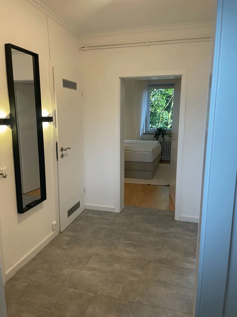 Chambre d'étudiant à  avec espace d'étude et installations communes