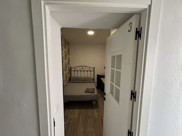 Quarto privado em Calle Cervantes, imagem 1 de 19