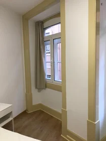 Stanza privata in Rua Corpo de Deus, immagine 1 di 10