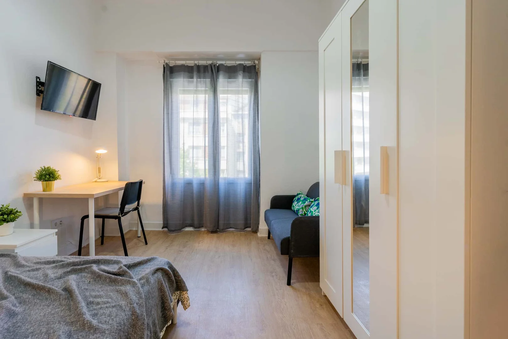 Student room in  with study area and shared facilities