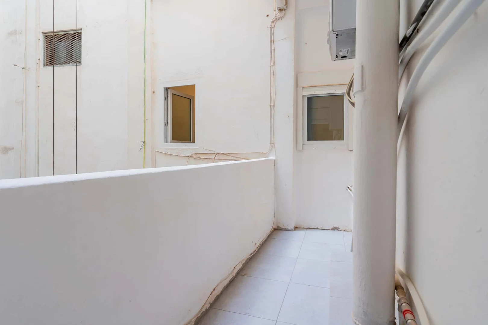 Student room in  with study area and shared facilities