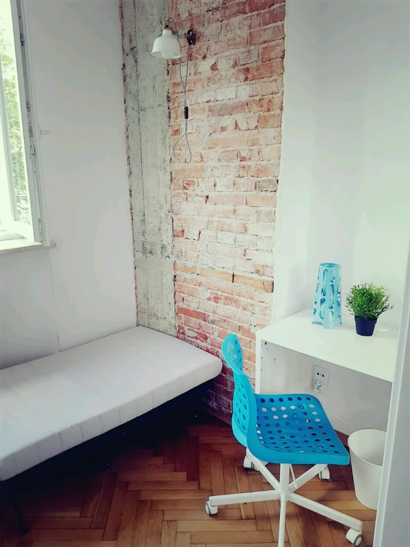 Student room in  with study area and shared facilities