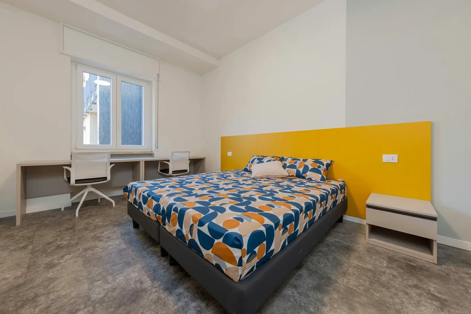 Student room in  with study area and shared facilities