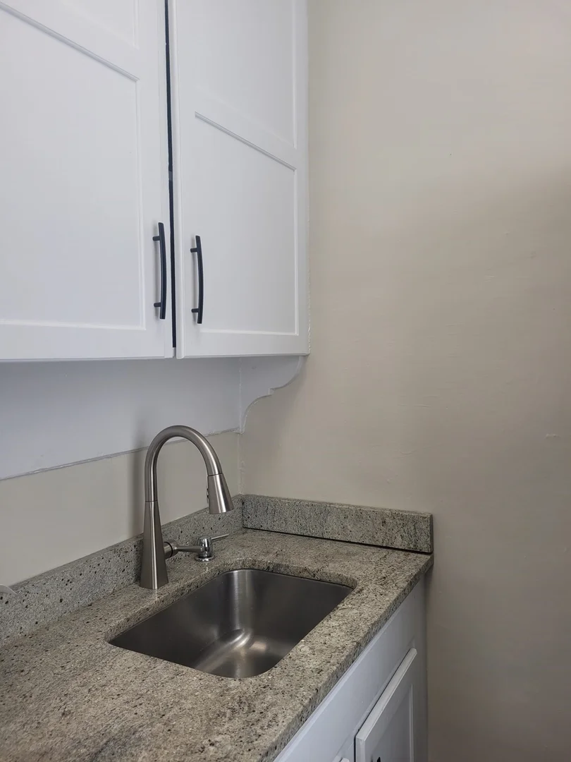 Affordable studio apartment with essential features in 