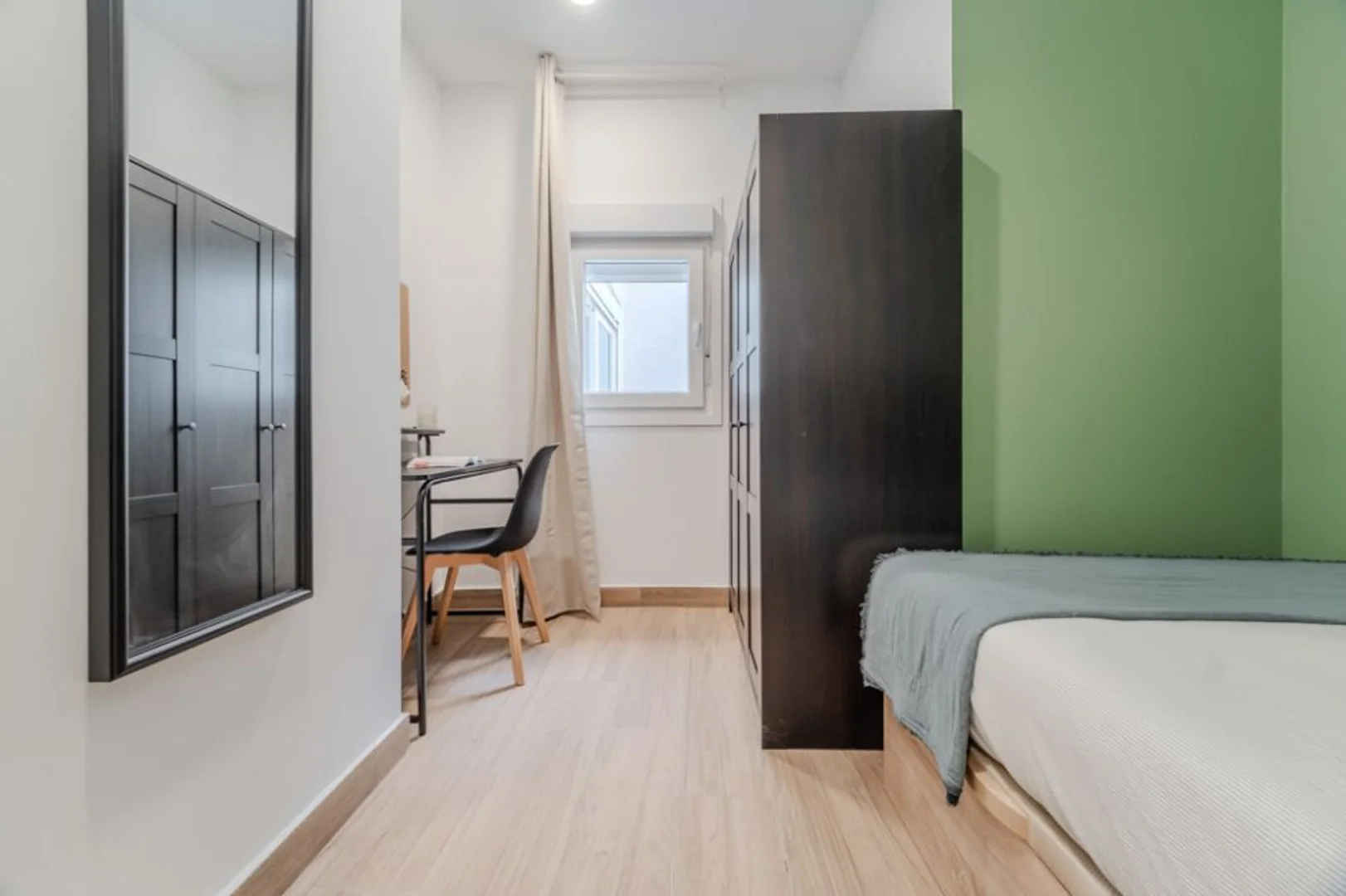Student room in  with study area and shared facilities