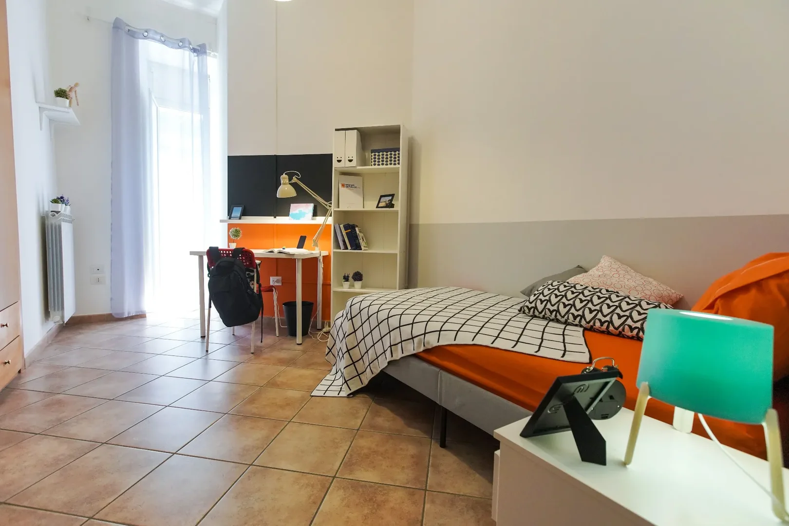 Affordable room for students with ample lighting in 
