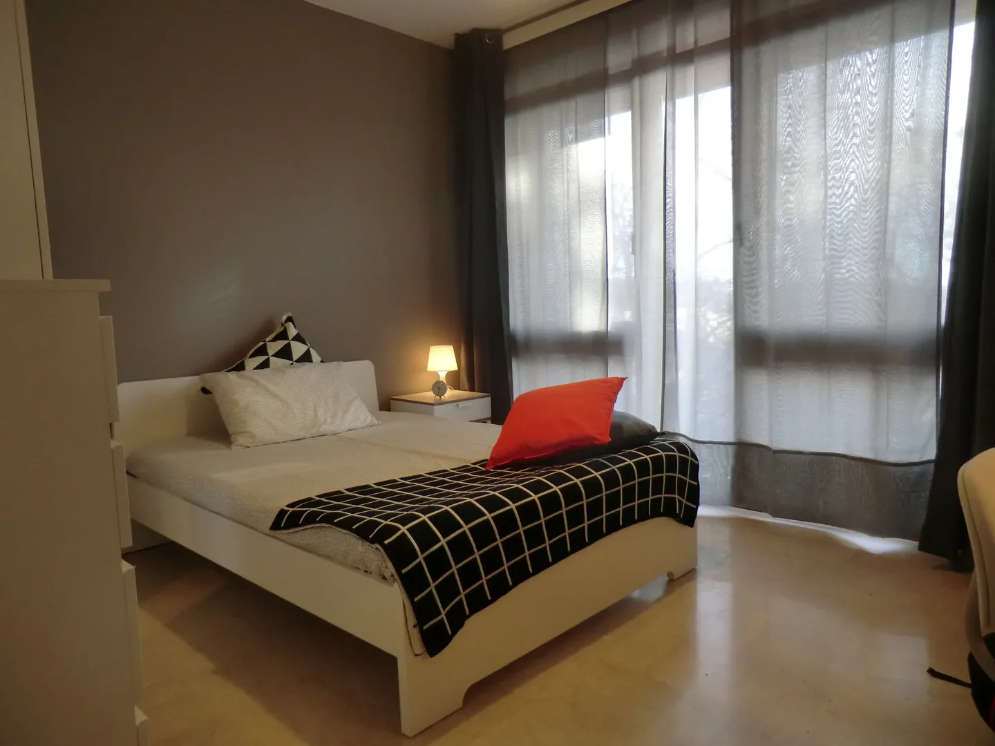 Student room in with study area and shared facilities