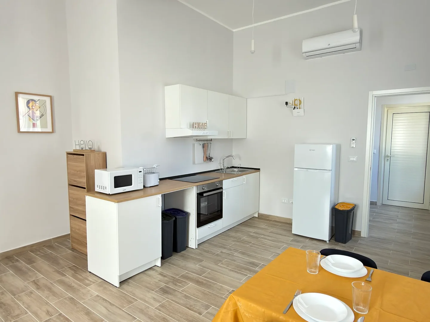 Affordable studio apartment with essential features in