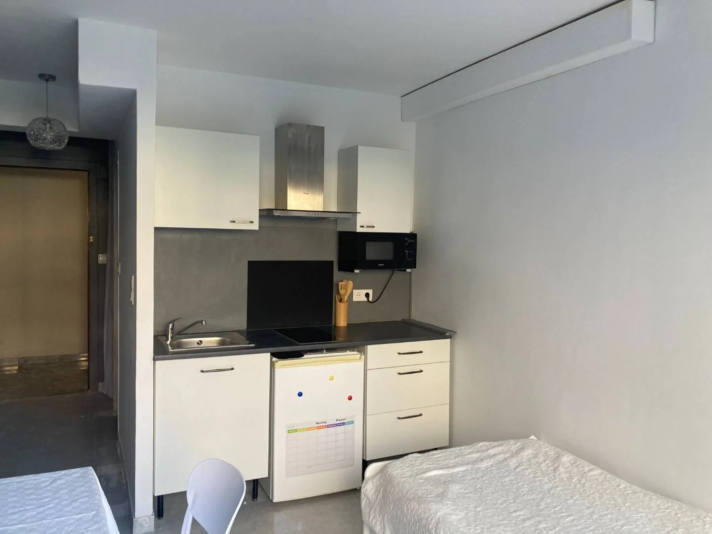 Affordable room for students with ample lighting in 