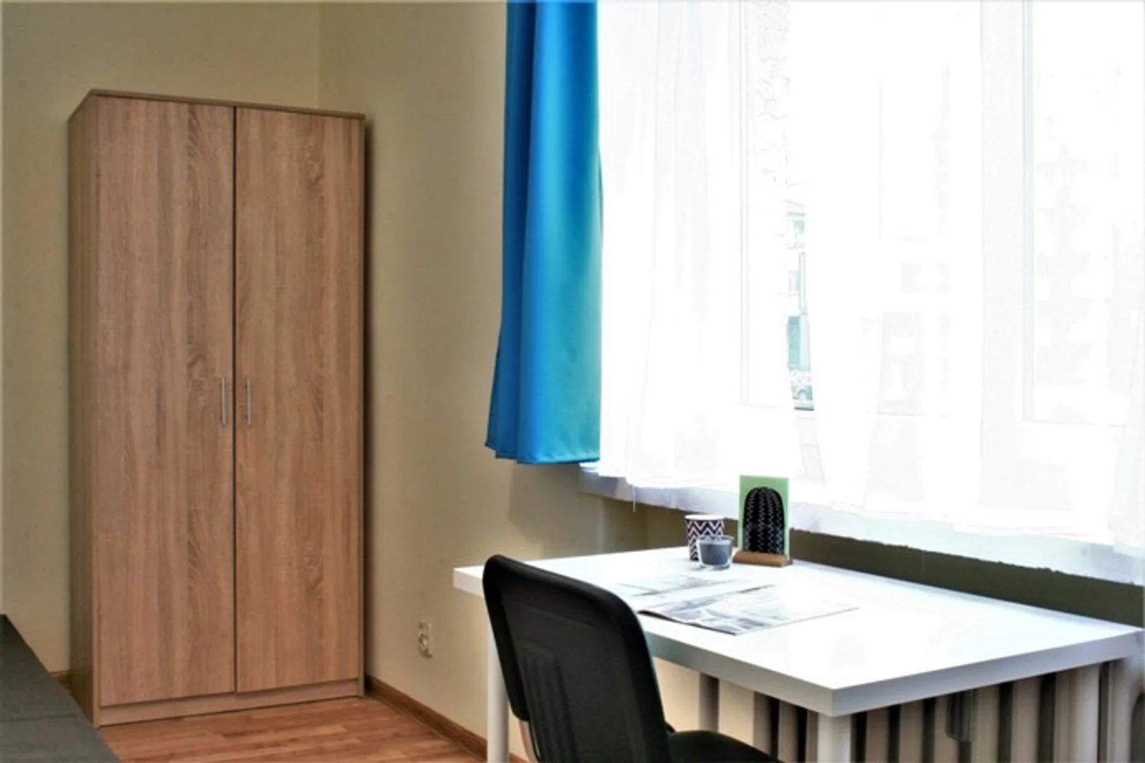 Student room in  with study area and shared facilities