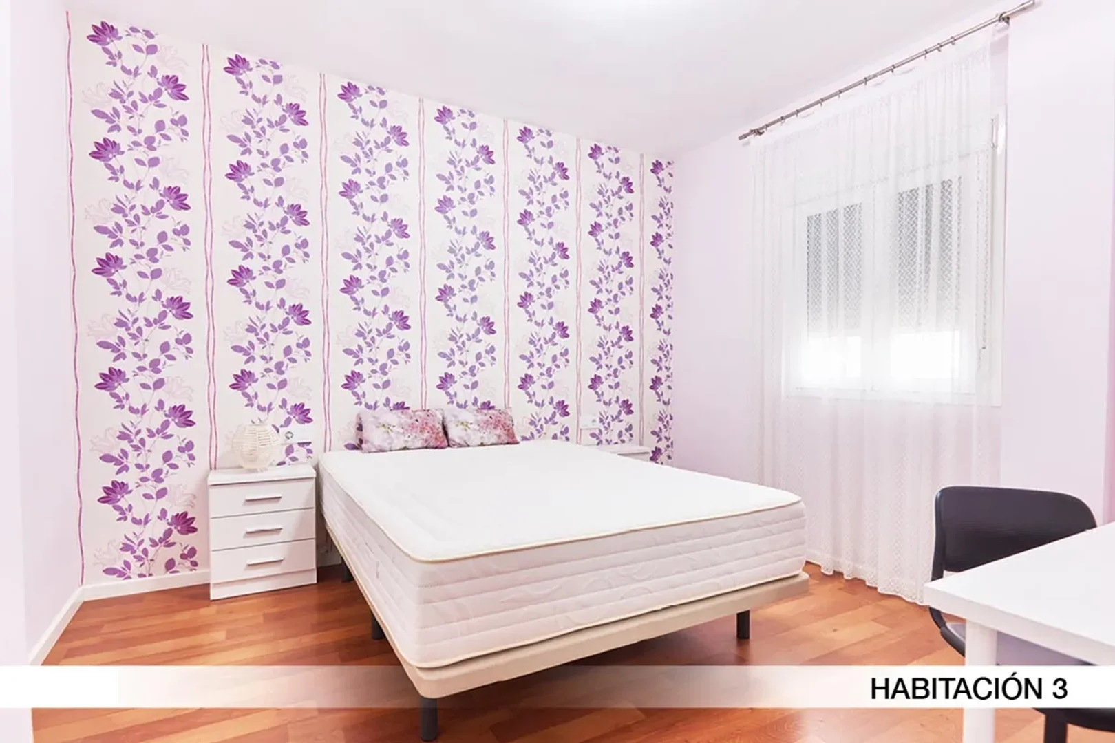 Student room in  with study area and shared facilities