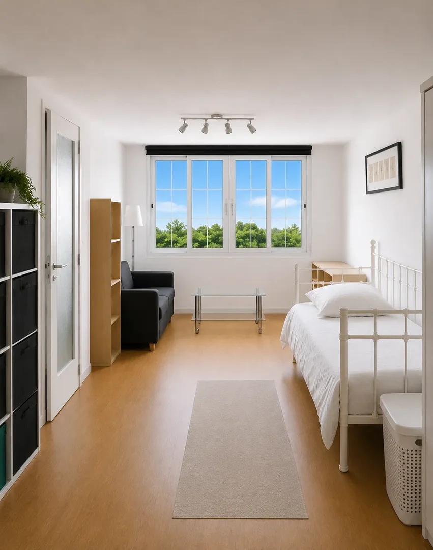 Chambre d'étudiant à  avec espace d'étude et installations communes
