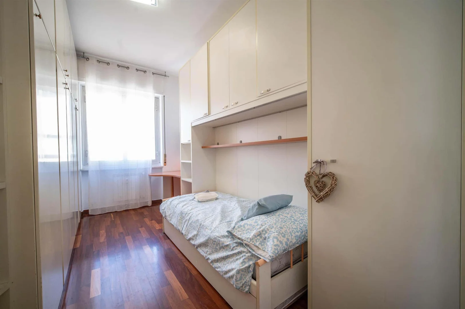 Student room in  with study area and shared facilities