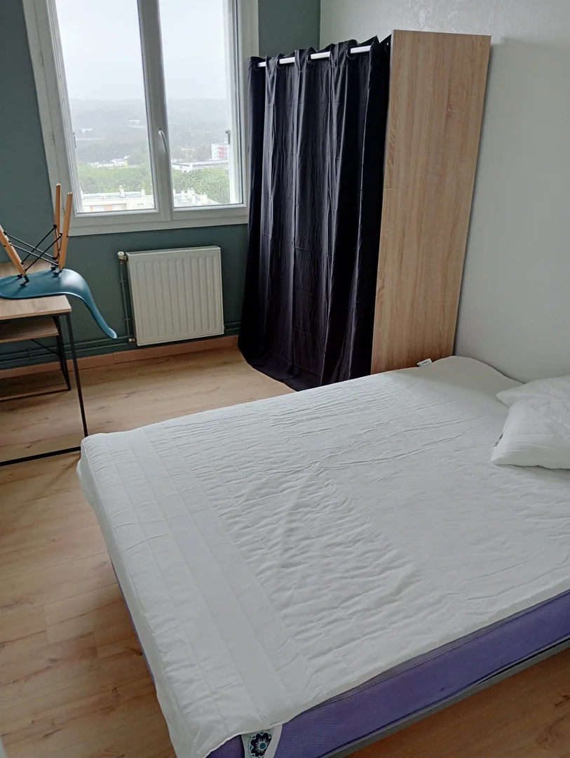 Student room in  with study area and shared facilities