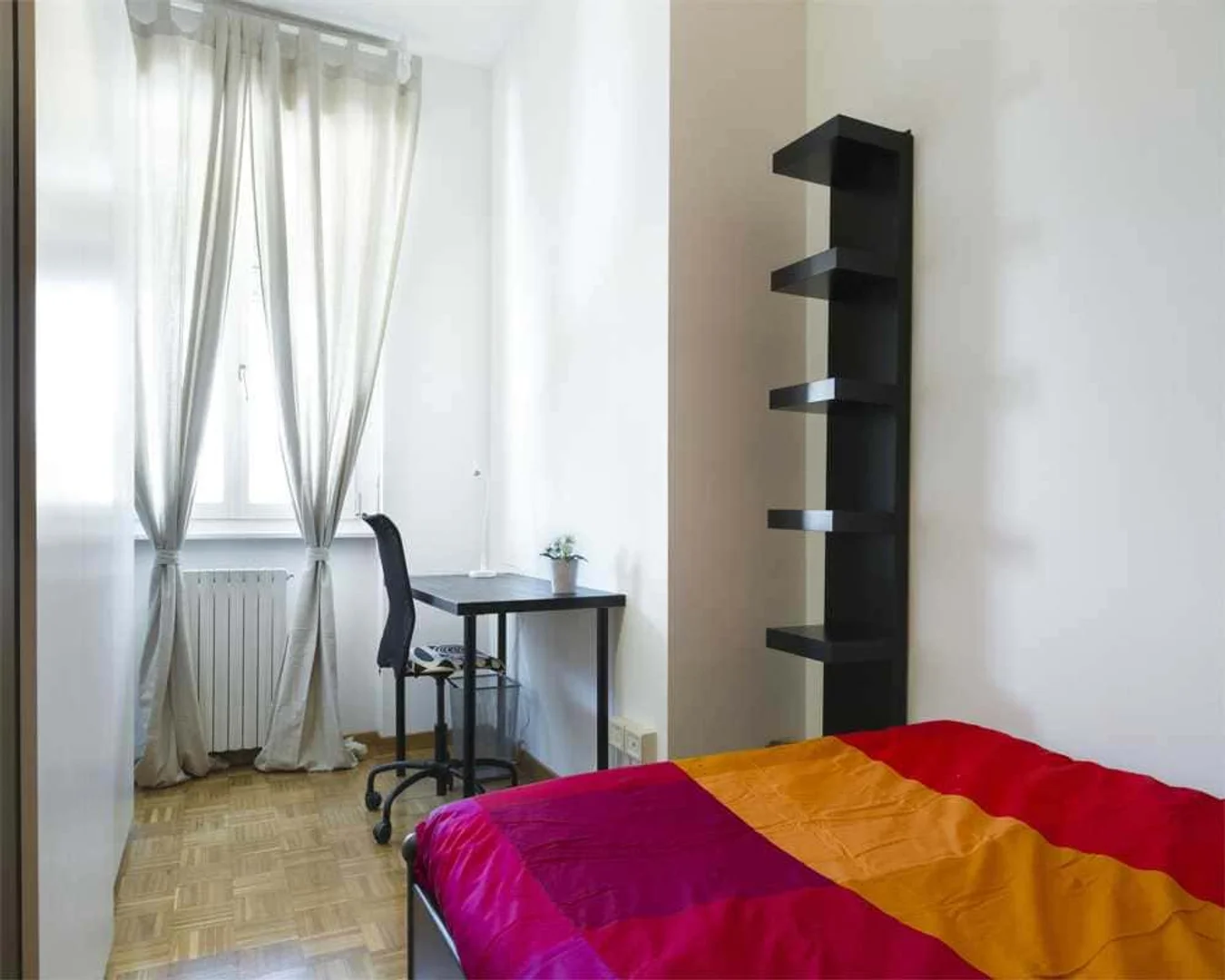 Affordable room for students with ample lighting in 