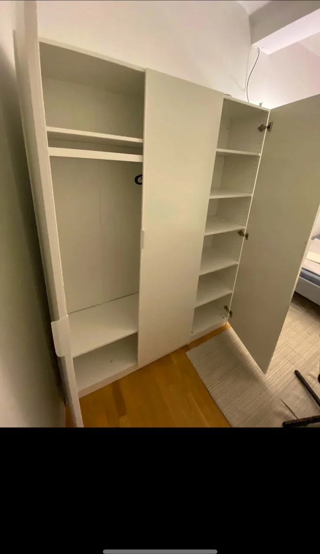 Affordable room for students with ample lighting in 