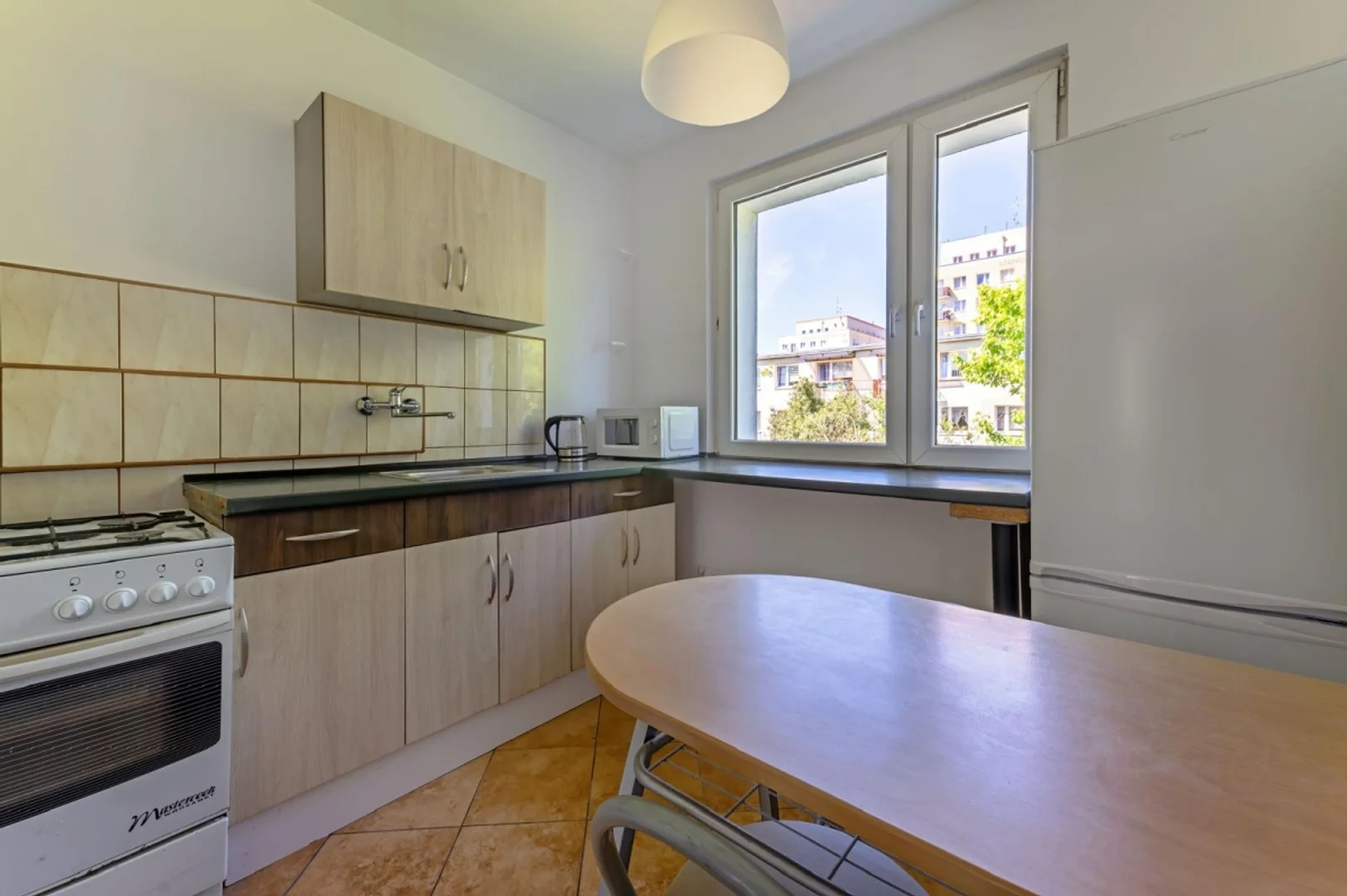 Affordable room for students with ample lighting in 