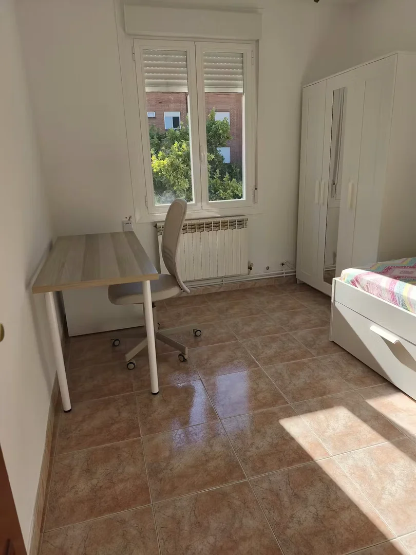 Student room in  with study area and shared facilities