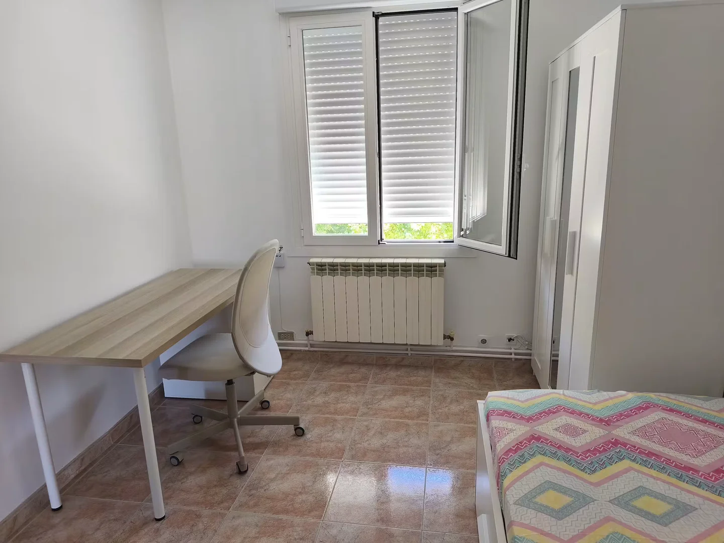 Student room in  with study area and shared facilities